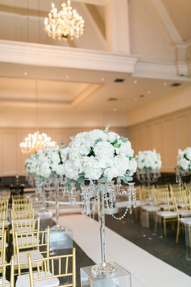 Swaneset wedding Tahni Godfrey aisle flowers candelabra