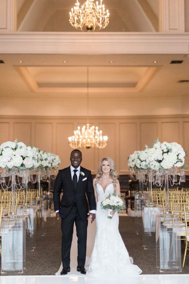 Swaneset wedding Tahni Godfrey couple seeing decor first time