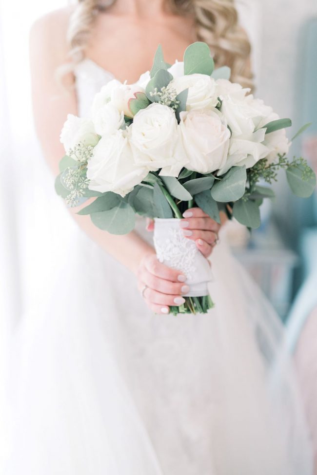 Swaneset wedding Tahni Godfrey Bride holding bouquet